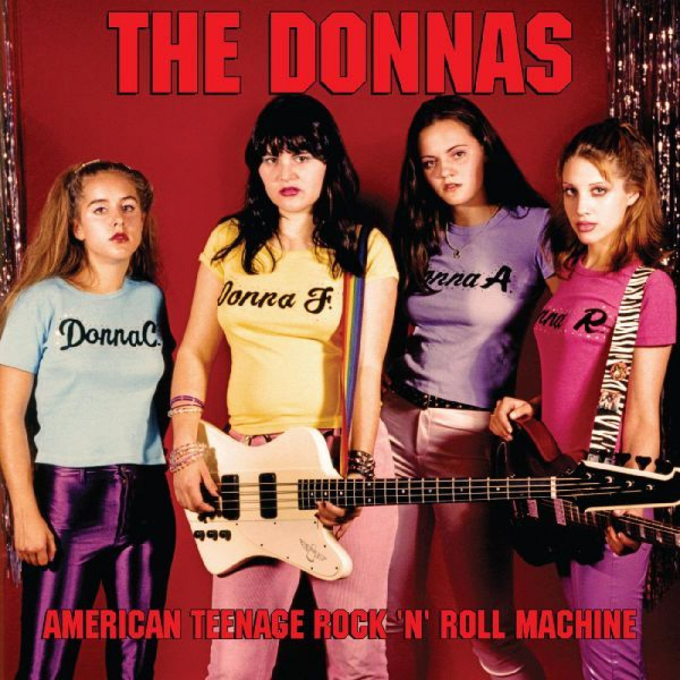 The Donnas - American Teenager Rock 'N' Roll Machine (LP Fire Orange with Black Swirl Vinyl)