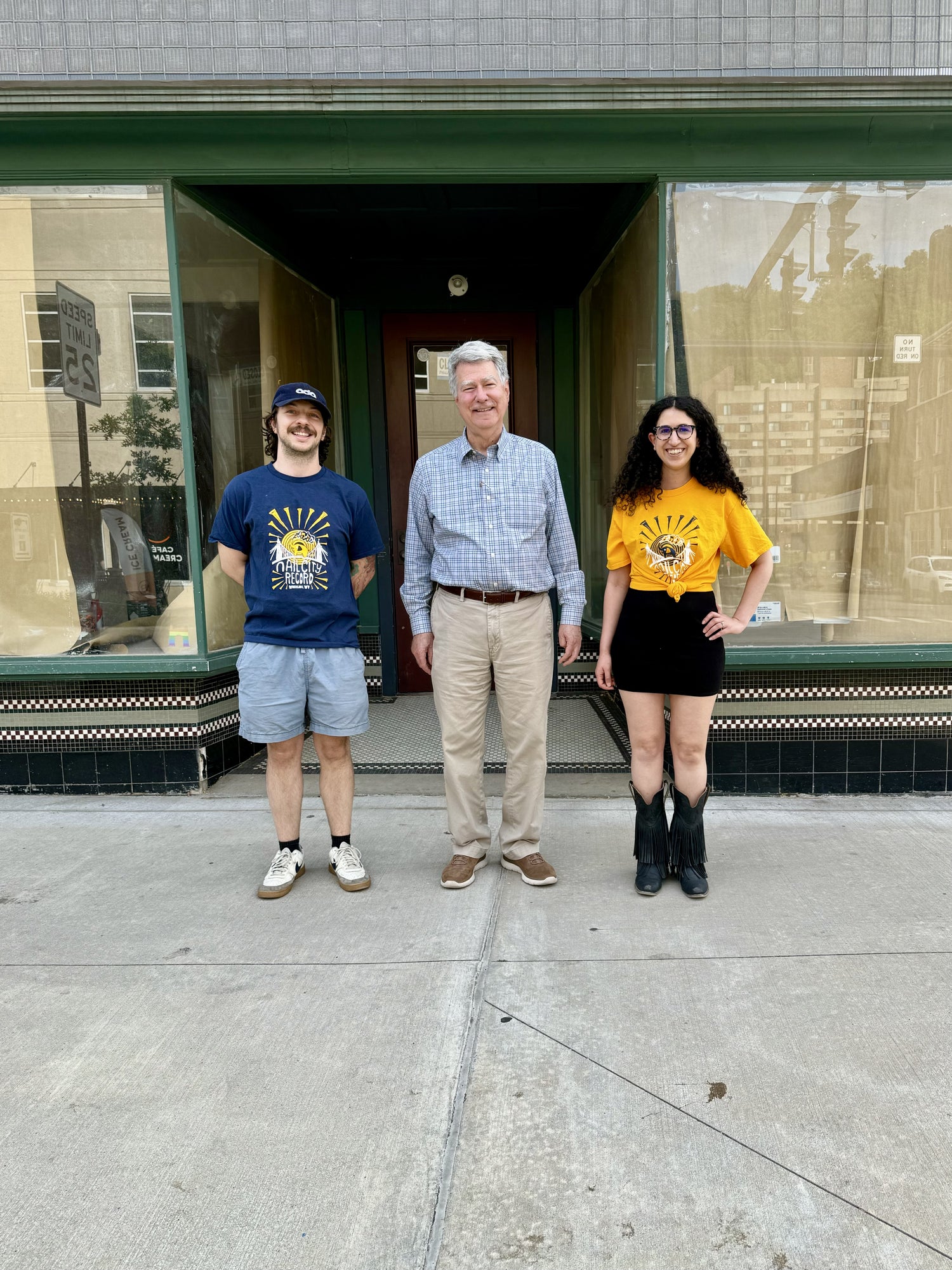 Molly Napier and Jon Napier with building owner CJ Kaiser at Nail City Record’s future downtown Wheeling location.